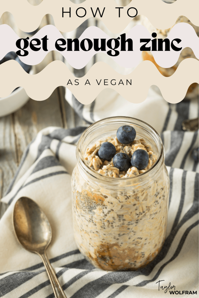 A jar of chia overnight oats with nut butter mixed in, topped with blueberries